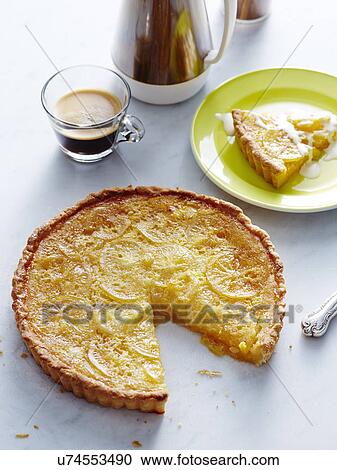 Still life of sliced Italian lemon tart View Large Photo Image Stock Image - Still life of sliced Italian lemon tart. Fotosearch