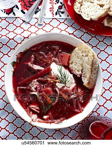 Stock Image - Still life of Ukrainian borscht with bread. Fotosearch