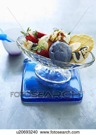 Still life with bowl of ice cream sundae View Large Photo Image Stock Image - Still life with bowl of ice cream sundae. Fotosearch