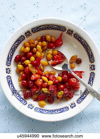 Still life with bowl of pickled chillies View Large Photo Image Stock Image - Still life with bowl of pickled chillies. Fotosearch