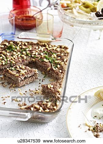 Still life with dish of kibbeh View Large Photo Image Stock Photo - Still life with dish of kibbeh. Fotosearch