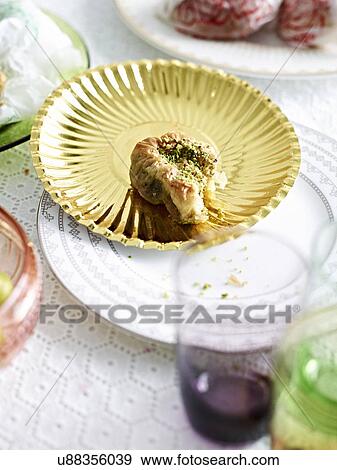Stock Photo - Still life with middle eastern pastry on table. Fotosearch