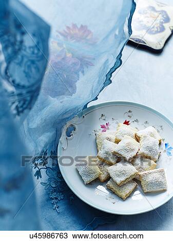 Still life with plate of Italian strucchi View Large Photo Image Stock Image - Still life with plate of Italian strucchi. Fotosearch