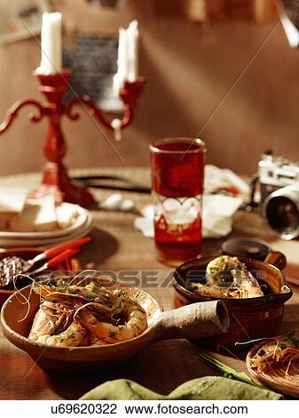 Table with bowls of fresh garlic prawns View Large Photo Image Stock Image - Table with bowls of fresh garlic prawns. Fotosearch