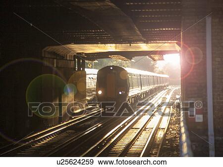 "Train entering tunnel, London, UK" View Large Photo Image Stock Photo - "Train entering tunnel, London, UK". Fotosearch