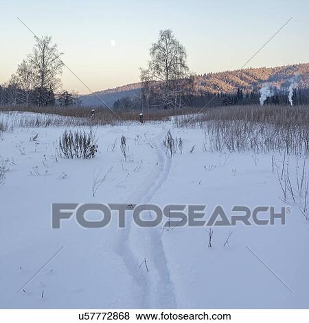 "View of distant chimney smoke and forest in snow covered landscape, Sarsy village, Sverdlovsk Oblast, Russia" View Large Photo Image Stock Photo - "View of distant chimney smoke and forest in snow covered landscape, Sarsy village, Sverdlovsk Oblast, Russia". Fotosearch