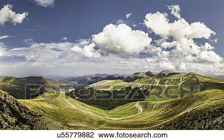 Stock Image - "View of winding roads in valley, Saint-Michel, Pyrenees, France (Near the Spanish-French border)". Fotosearch