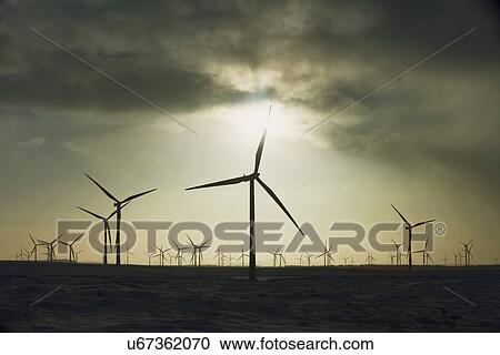 "Wind turbines against overcast sky, Ayrshire, Scotland" View Large Photo Image Stock Image - "Wind turbines against overcast sky, Ayrshire, Scotland". Fotosearch