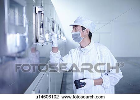 "Worker at e-cigarettes battery factory, Guangdong, China" View Large Photo Image Stock Image - "Worker at e-cigarettes battery factory, Guangdong, China". Fotosearch