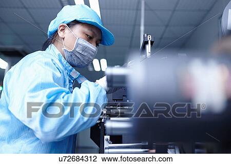 "Worker at e-cigarettes battery factory, Guangdong, China" View Large Photo Image Stock Image - "Worker at e-cigarettes battery factory, Guangdong, China". Fotosearch