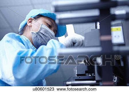 "Worker at e-cigarettes battery factory, Guangdong, China" View Large Photo Image Stock Image - "Worker at e-cigarettes battery factory, Guangdong, China". Fotosearch