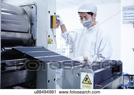 "Worker at e-cigarettes battery factory, Guangdong, China" View Large Photo Image Stock Image - "Worker at e-cigarettes battery factory, Guangdong, China". Fotosearch
