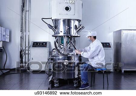 "Worker at e-cigarettes battery factory, Guangdong, China" View Large Photo Image Stock Image - "Worker at e-cigarettes battery factory, Guangdong, China". Fotosearch