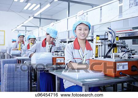 "Workers at e-cigarettes battery factory, Guangdong, China" View Large Photo Image Stock Photograph - "Workers at e-cigarettes battery factory, Guangdong, China". Fotosearch