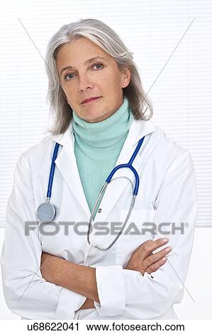 Mature female doctor View Large Photo Image Stock Image - Mature female doctor. Fotosearch