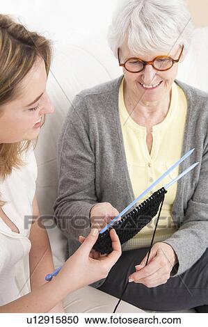 Stock Image - Women knitting. Fotosearch
