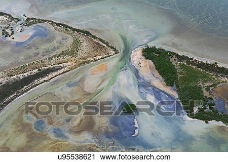 Stock Image - "Aerial view of coast and sea at Sian Ka'an natural reserve, Quintana Roo, Mexico". Fotosearch
