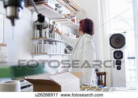 Artist working in studio View Large Photo Image Stock Photo - Artist working in studio. Fotosearch