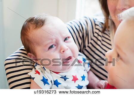 Baby girl crying View Large Photo Image Stock Image - Baby girl crying. Fotosearch
