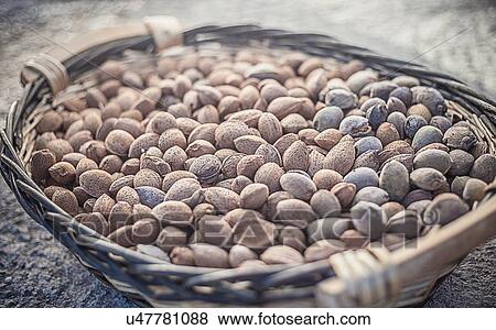 Stock Photo - Basket full of almonds. Fotosearch