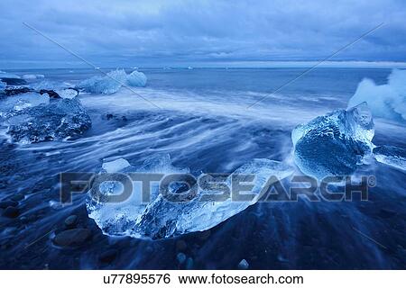 Stock Photograph - "Beach with black sand near Jokulsarlon Lagoon, Iceland". Fotosearch