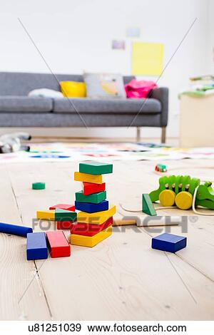 Building blocks and toys on floor View Large Photo Image Stock Photo - Building blocks and toys on floor. Fotosearch