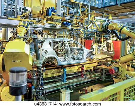 Car bodies on production line in car factory View Large Photo Image Picture - Car bodies on production line in car factory. Fotosearch