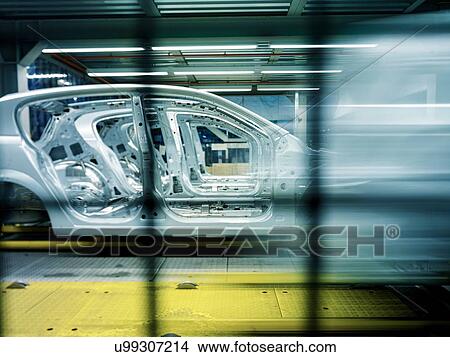 Picture - Car bodies on production line in car factory. Fotosearch