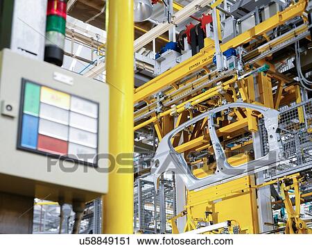 "Car body on production line in car factory, low angle view" View Large Photo Image Stock Image - "Car body on production line in car factory, low angle view". Fotosearch