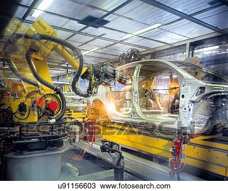 Car body welding robots in car factory View Large Photo Image Stock Image - Car body welding robots in car factory. Fotosearch