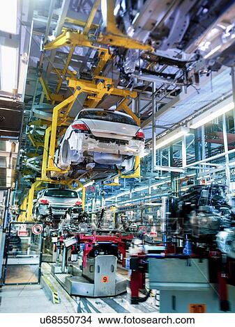 "Car production line in car factory, low angle view" View Large Photo Image Picture - "Car production line in car factory, low angle view". Fotosearch