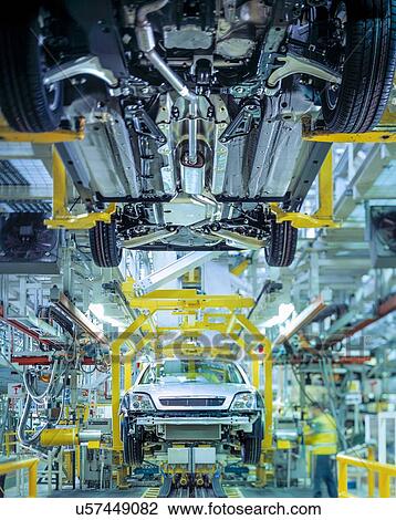 Stock Image - Cars on production line in car factory. Fotosearch