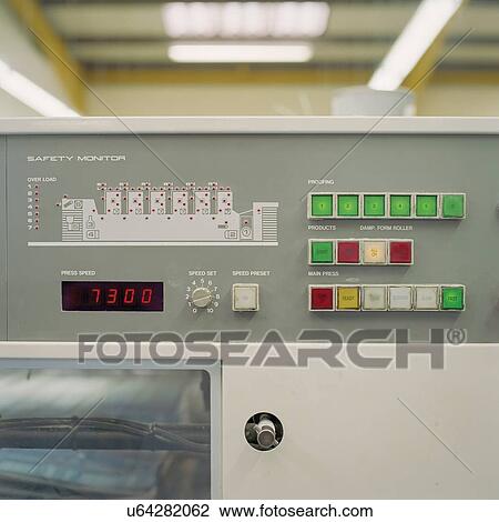 Stock Image - Close up detail of printing machine in printworks. Fotosearch