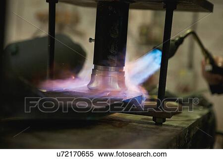 Close up of blow torch flame on metal View Large Photo Image Stock Photography - Close up of blow torch flame on metal. Fotosearch