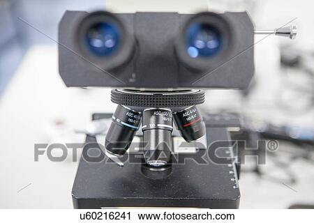 Close up of microscope in laboratory View Large Photo Image Stock Image - Close up of microscope in laboratory. Fotosearch