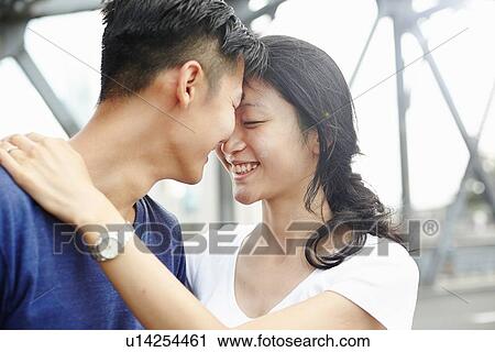 "Close up of smiling romantic couple, The Bund, Shanghai, China" View Large Photo Image Stock Image - "Close up of smiling romantic couple, The Bund, Shanghai, China". Fotosearch