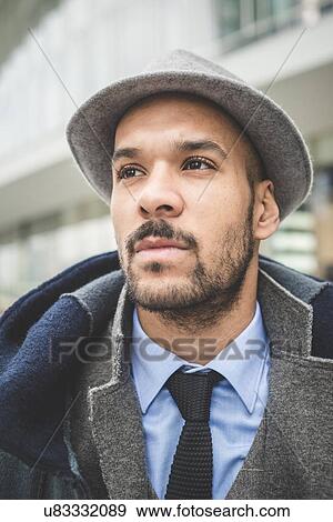 Close up portrait of businessman waiting outside office building View Large Photo Image Stock Photo - Close up portrait of businessman waiting outside office building. Fotosearch