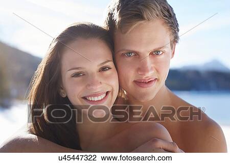"Close up portrait of romantic young couple at lakeside, German Alps, Germany" View Large Photo Image Stock Image - "Close up portrait of romantic young couple at lakeside, German Alps, Germany". Fotosearch