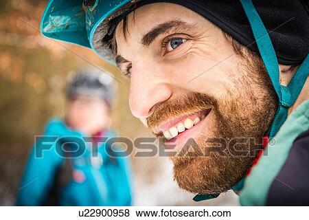 Stock Photo - Close up portrait of young male mountain biker. Fotosearch