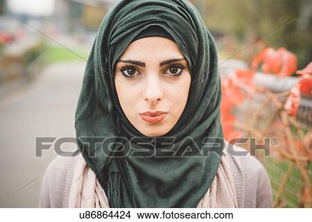 Close up portrait of young woman wearing hijab View Large Photo Image Picture - Close up portrait of young woman wearing hijab. Fotosearch
