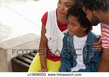 "Couple and son sitting on park bench, Ipanema beach, Rio De Janeiro, Brazil" View Large Photo Image Stock Image - "Couple and son sitting on park bench, Ipanema beach, Rio De Janeiro, Brazil". Fotosearch