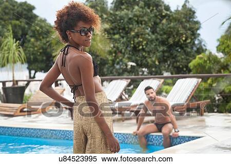 "Couple by terrace pool, Sugarloaf Mountain in background, RIo, Brazil" View Large Photo Image Stock Photography - "Couple by terrace pool, Sugarloaf Mountain in background, RIo, Brazil". Fotosearch