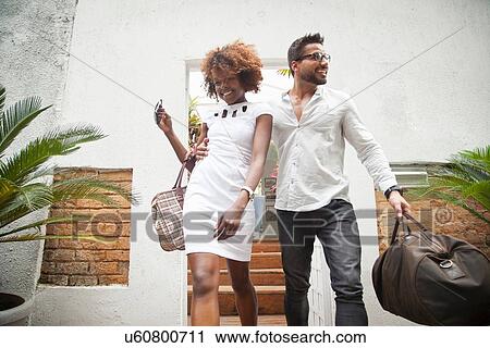 Couple going on holiday View Large Photo Image Stock Image - Couple going on holiday. Fotosearch