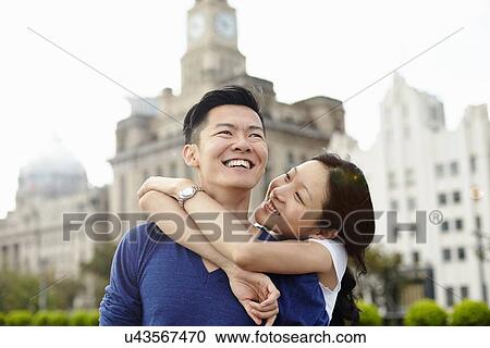 "Couple hugging, The Bund, Shanghai, China" View Large Photo Image Stock Image - "Couple hugging, The Bund, Shanghai, China". Fotosearch