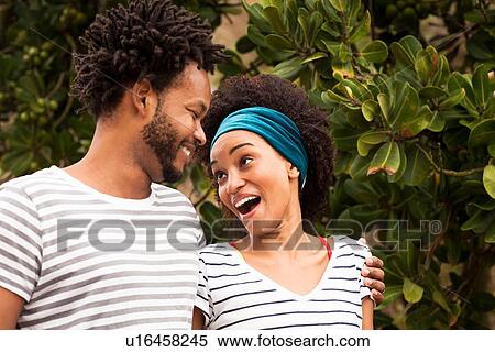 "Couple laughing and chatting on Ipanema Beach, Rio De Janeiro, Brazil" View Large Photo Image Stock Photography - "Couple laughing and chatting on Ipanema Beach, Rio De Janeiro, Brazil". Fotosearch