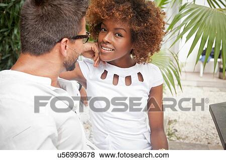 Couple talking outdoors View Large Photo Image Stock Photo - Couple talking outdoors. Fotosearch