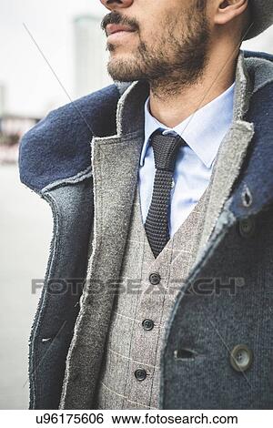 Cropped shot of businessman in city View Large Photo Image Stock Photograph - Cropped shot of businessman in city. Fotosearch