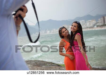 "Cropped shot of man photographing two young women on Ipanema beach, Rio De Janeiro, Brazil" View Large Photo Image Stock Photograph - "Cropped shot of man photographing two young women on Ipanema beach, Rio De Janeiro, Brazil". Fotosearch