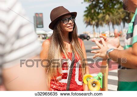 "Cropped shot of skateboarders chatting on sidewalk, Copacabana, Rio De Janeiro, Brazil" View Large Photo Image Stock Photography - "Cropped shot of skateboarders chatting on sidewalk, Copacabana, Rio De Janeiro, Brazil". Fotosearch