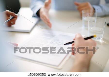 Cropped view of businessman signing contract at meeting View Large Photo Image Stock Image - Cropped view of businessman signing contract at meeting. Fotosearch